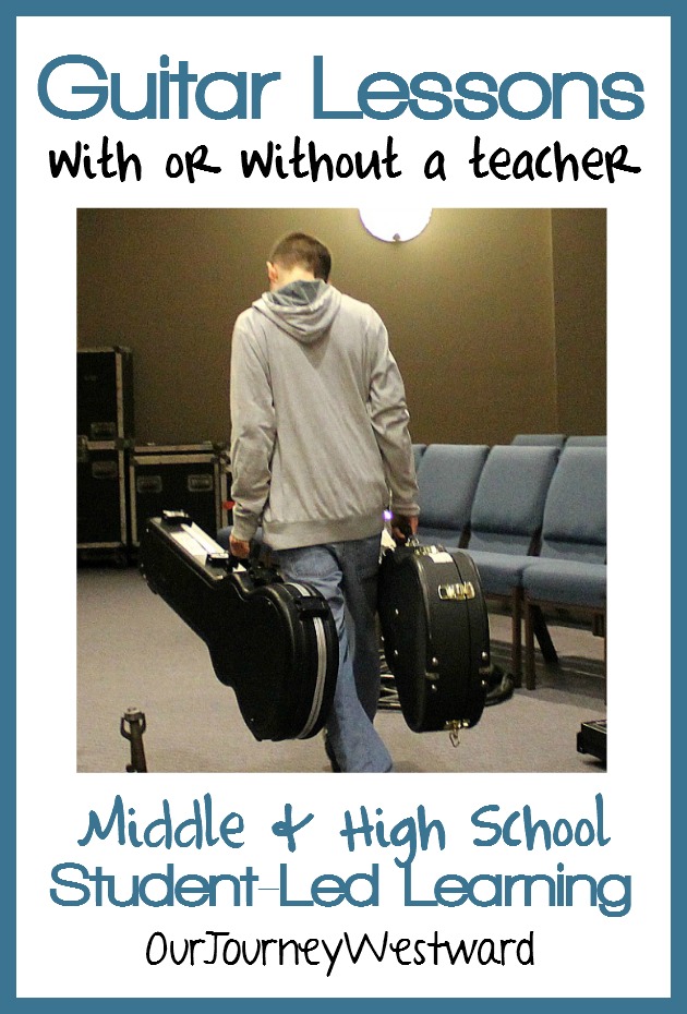 Boy carries two guitar cases. The image is used or a blog post about guitar lessons